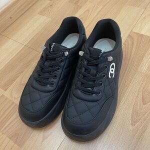 Women’s Black Quilted Sneakers in excellent condition